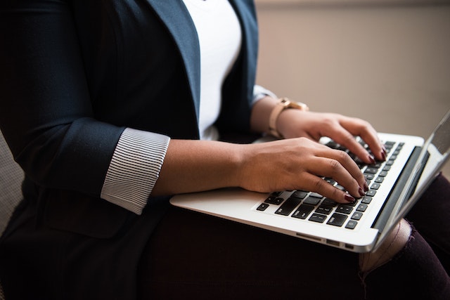 person on computer